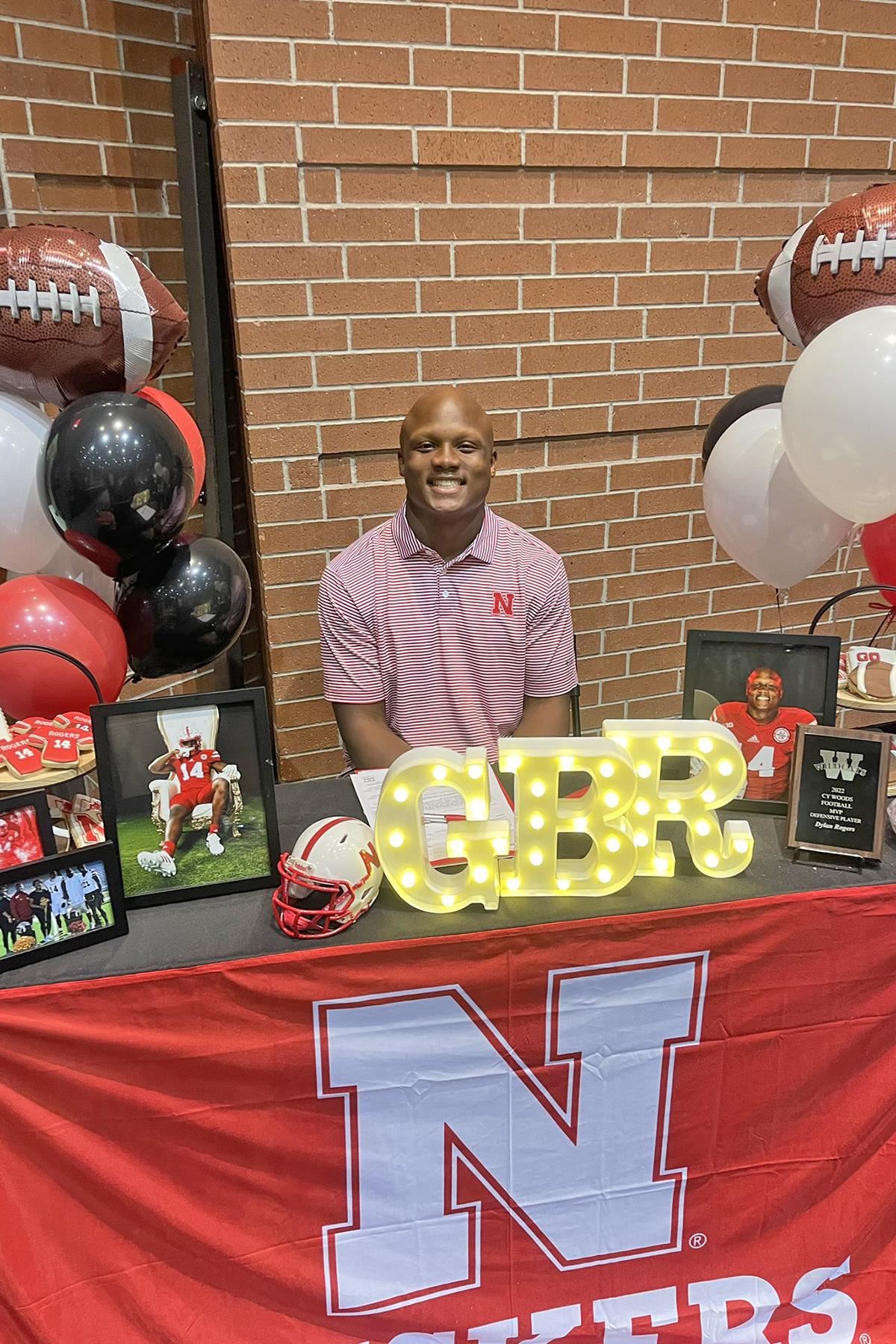 Cypress Woods High School senior Dylan Rogers signed a letter of intent to play football at the University of Nebraska.